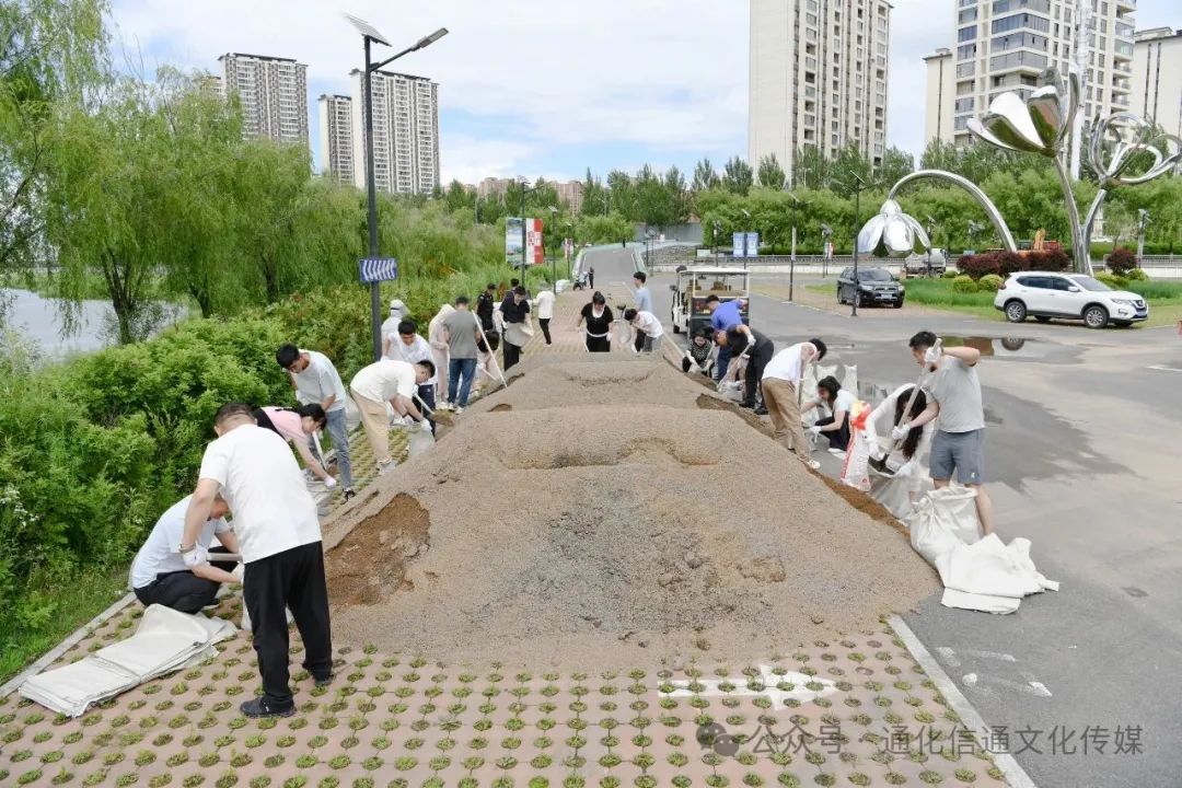 党建引领践初心 防汛备汛显担当—— 文旅党支部主题党日活动